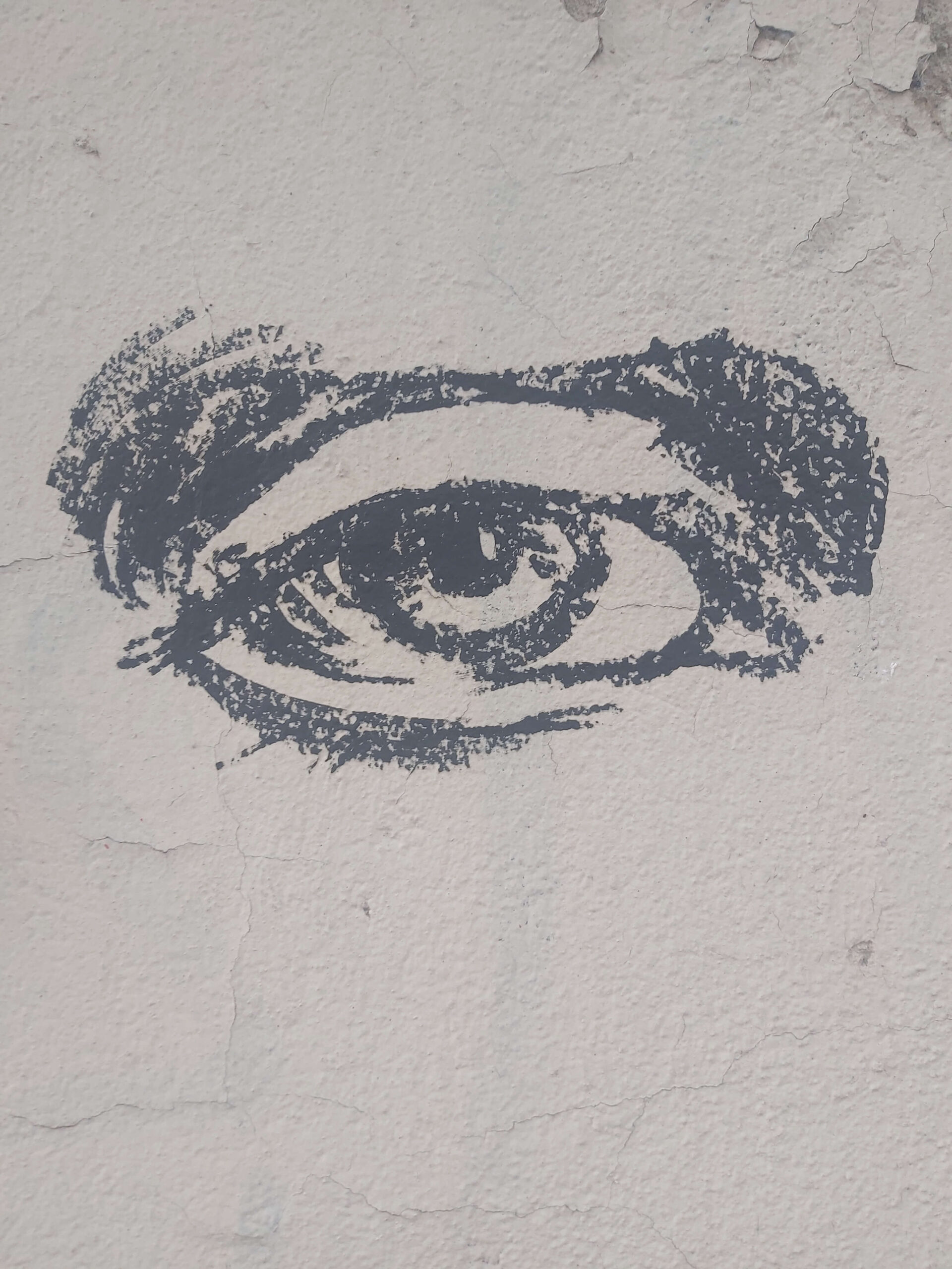 A graffiti image of an eye in Milan, Italy