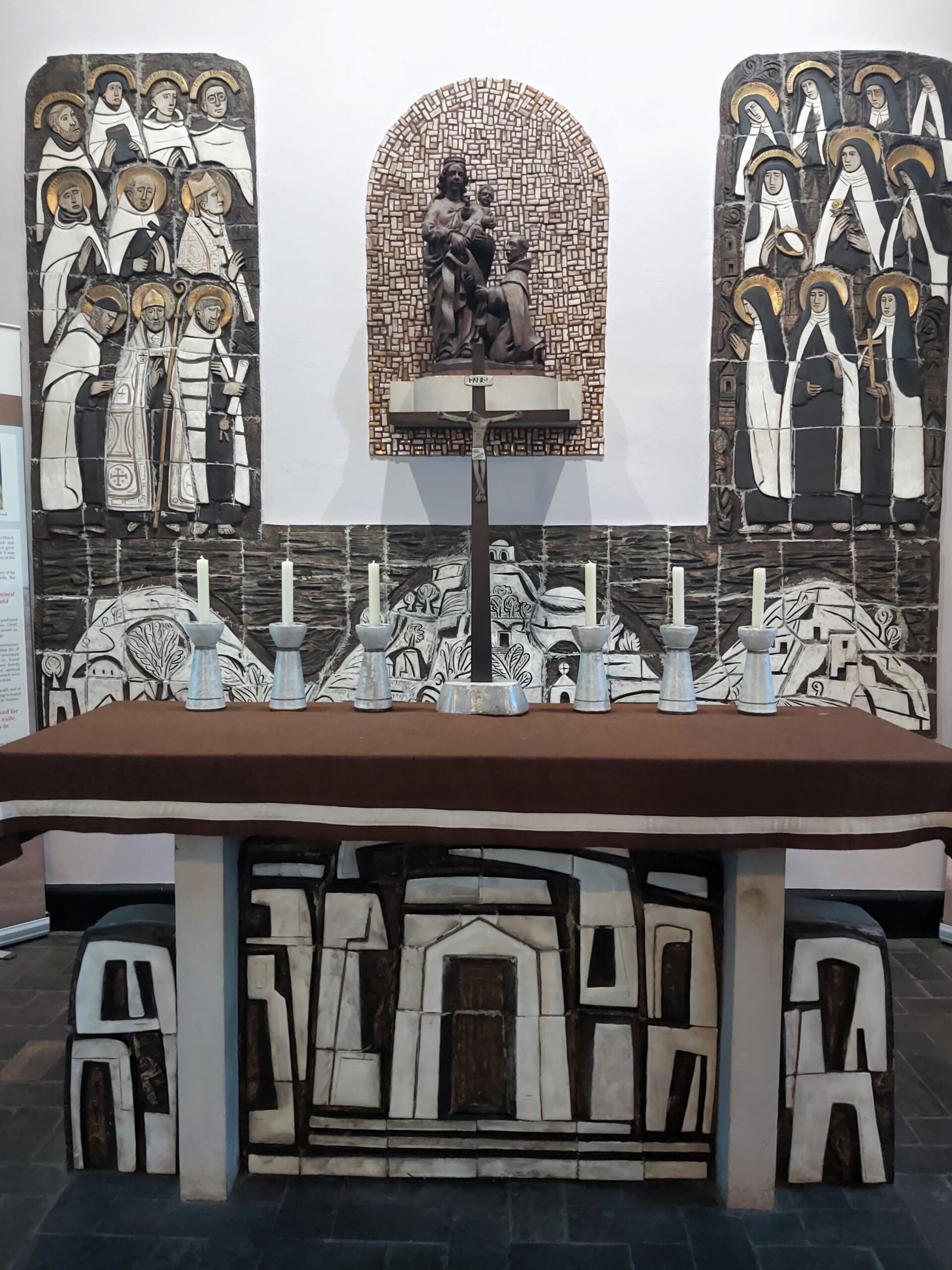 A brown and cream artistic style altar in The Friars Aylesford Priory, Kent, England