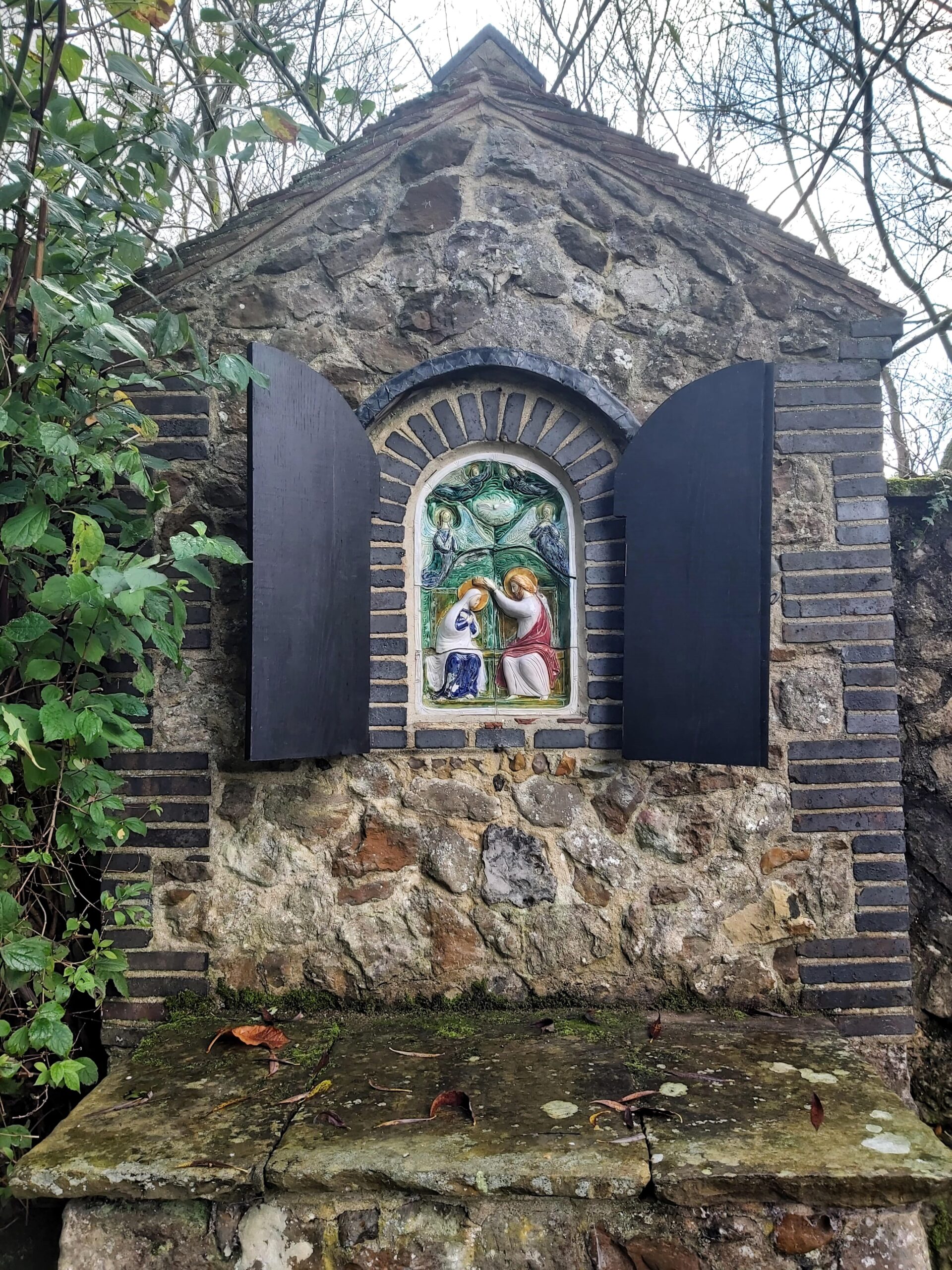 Religious art in the garden of The Friars Aylesford Priory, Kent, England