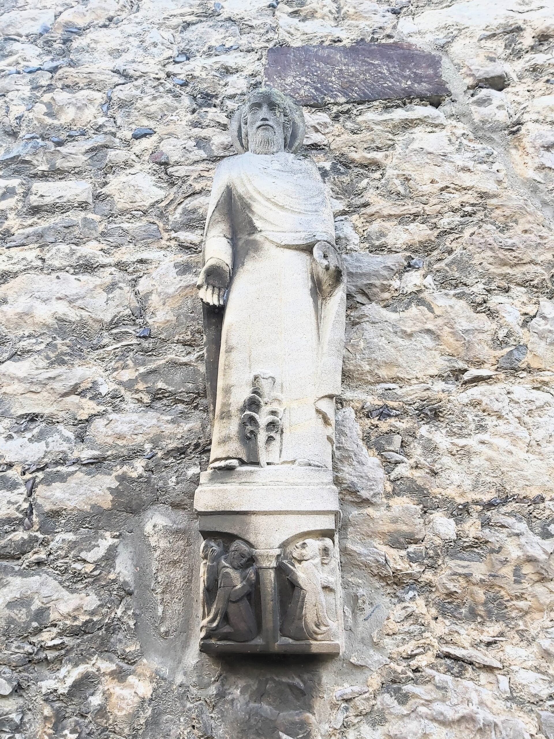 A statuette on the wall at The Friars Aylesford Priory, Kent, England