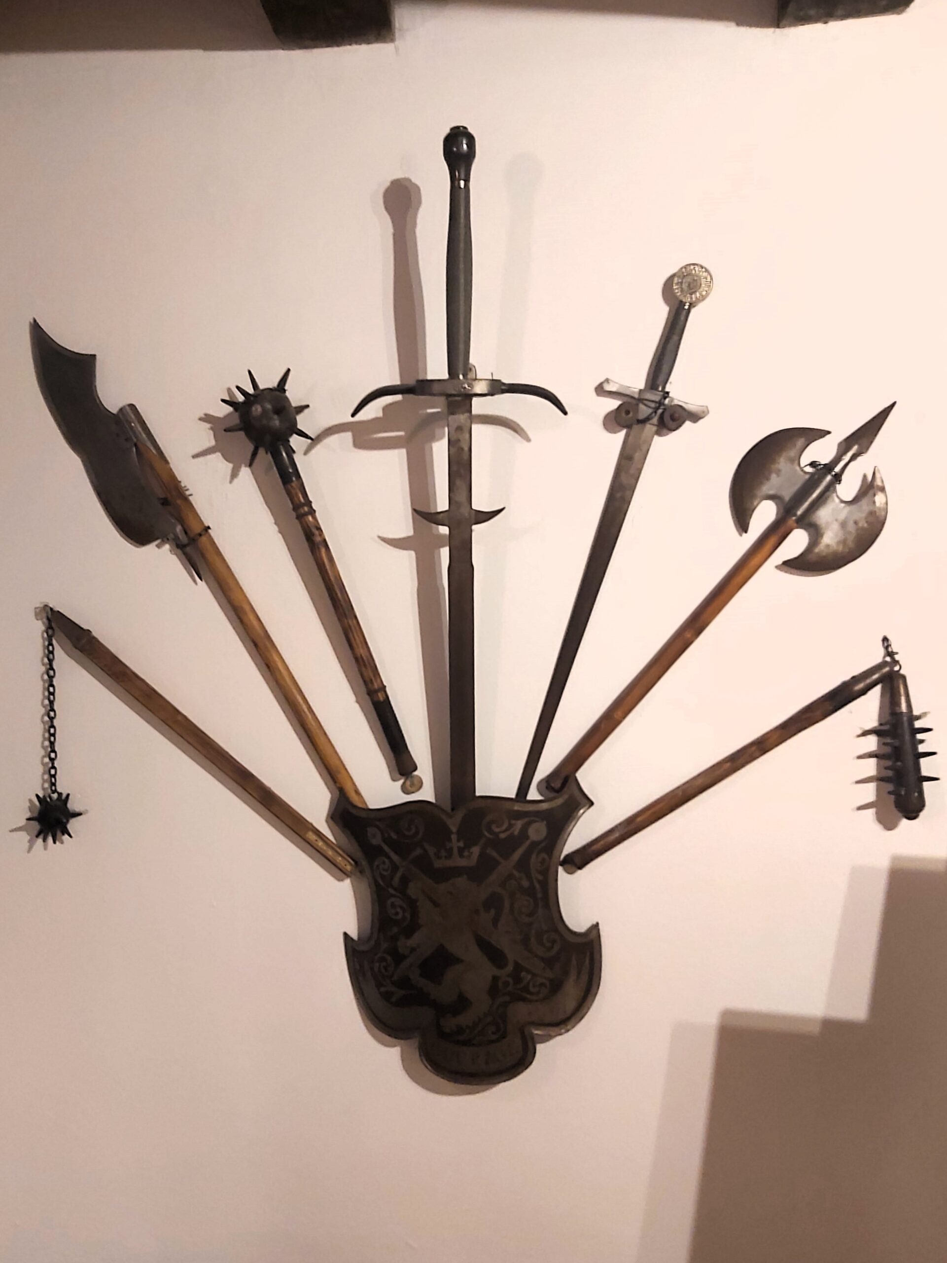 Multiple swords and flails in Bran Castle, Romania