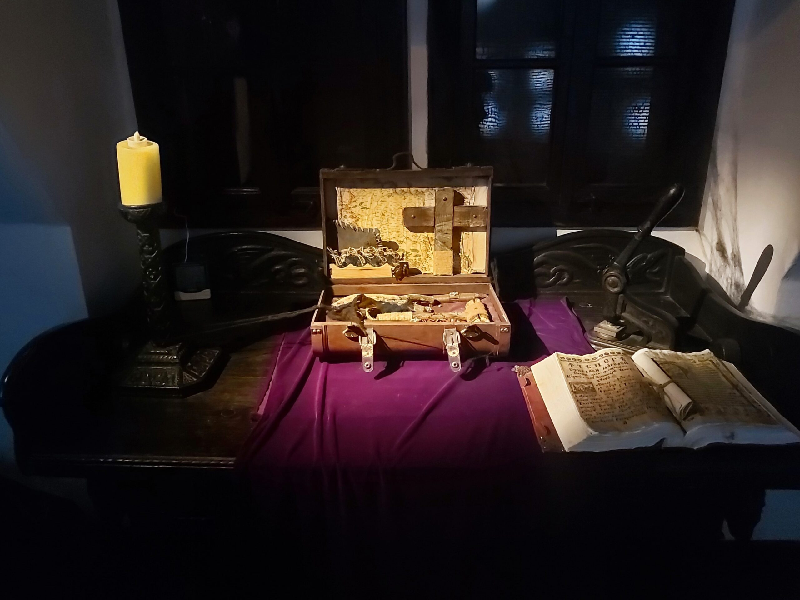 Vampire hunting kit on an old desk in Bran Castle, Romania
