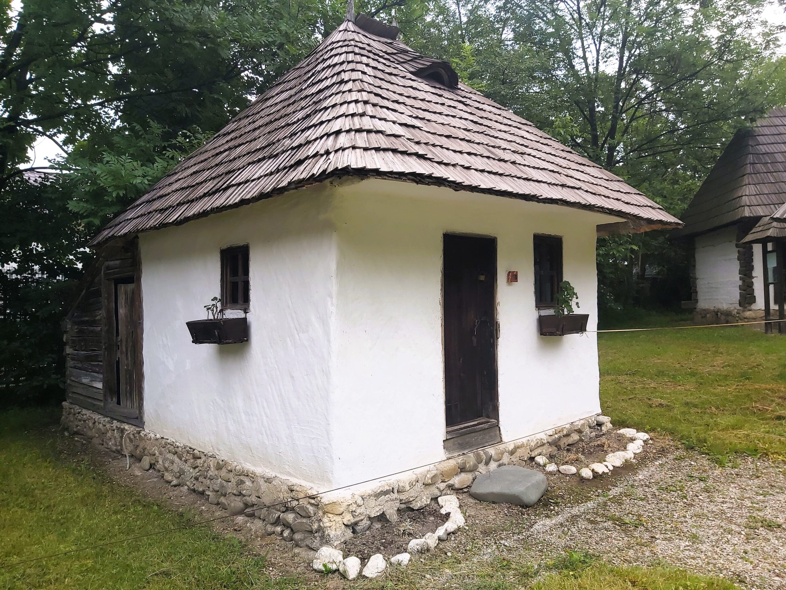 An old reconstructed white house in Bran, Romania