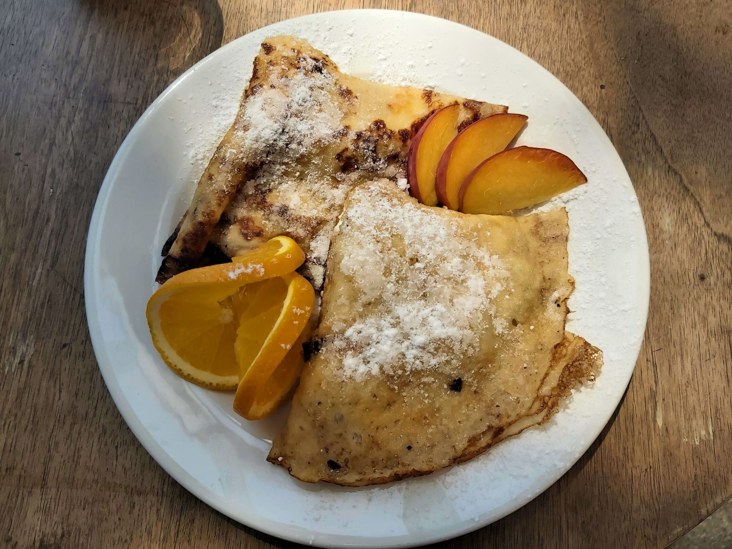 Pancakes with peaches and walnuts, Budapest, Hungary