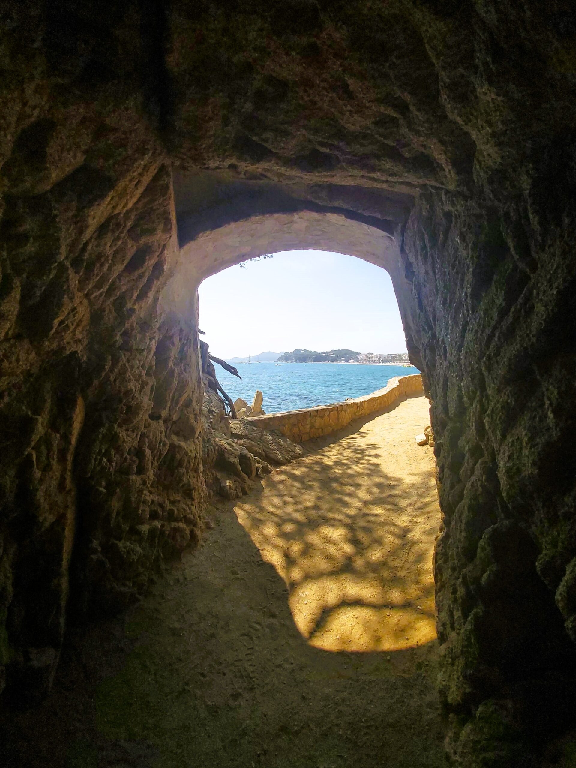 Sea view through a tunnel in Lloret de Mar, Spain