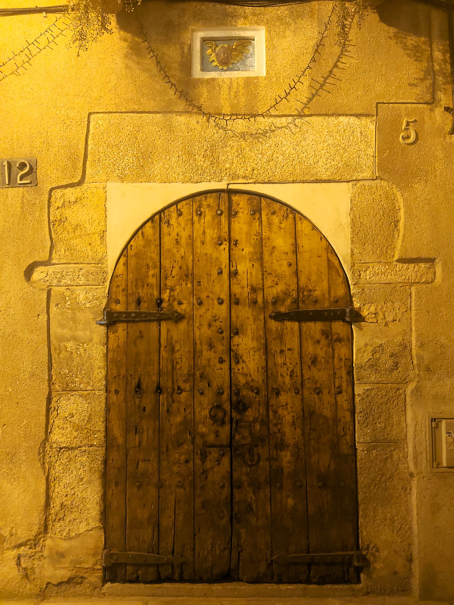 Old door in Lloret de Mar, Spain