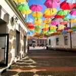Colourful umbrellas suspended in Old Town Timisoara, Romania