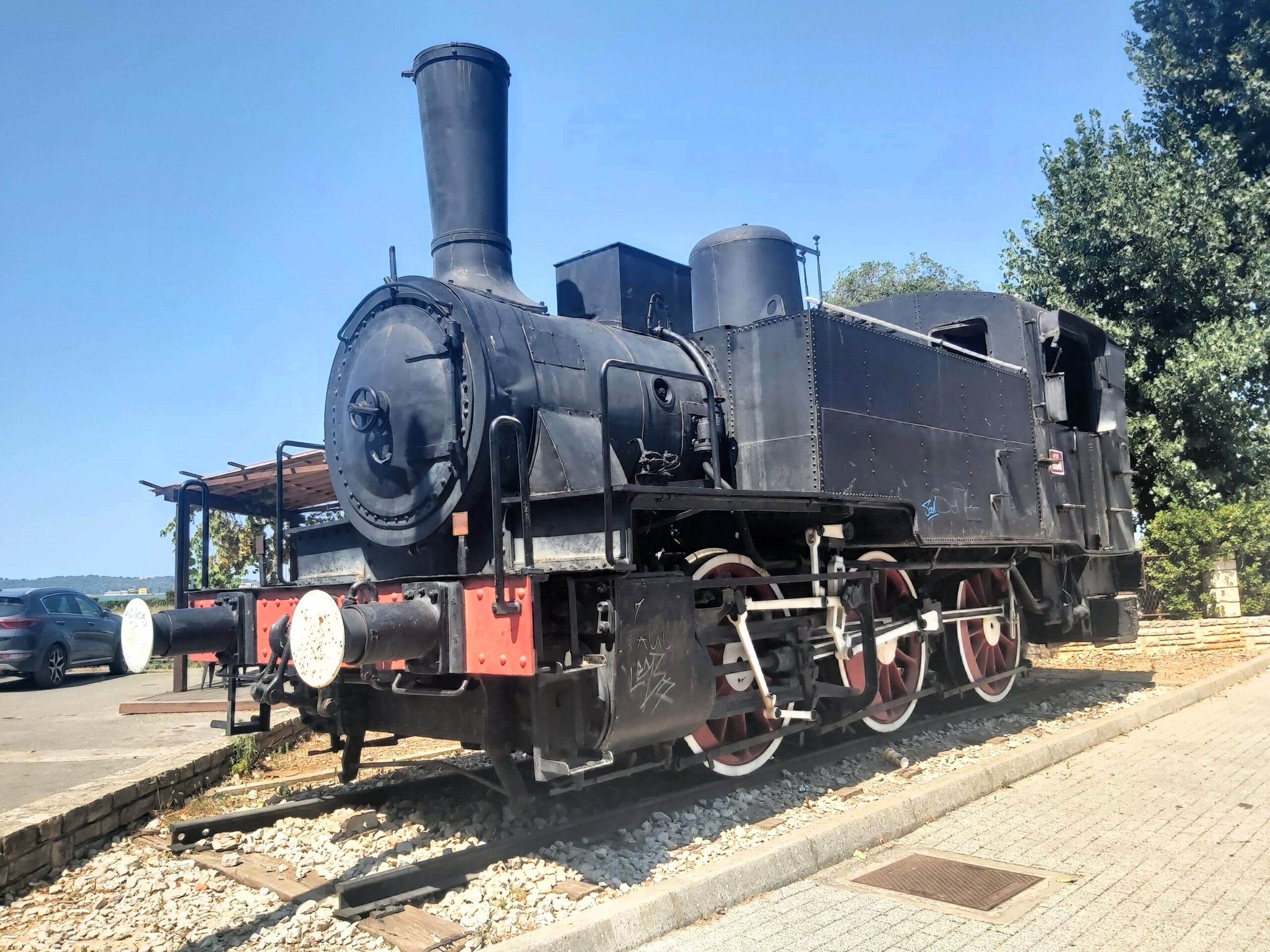 Black steam engine outside Pula train station, Croatia