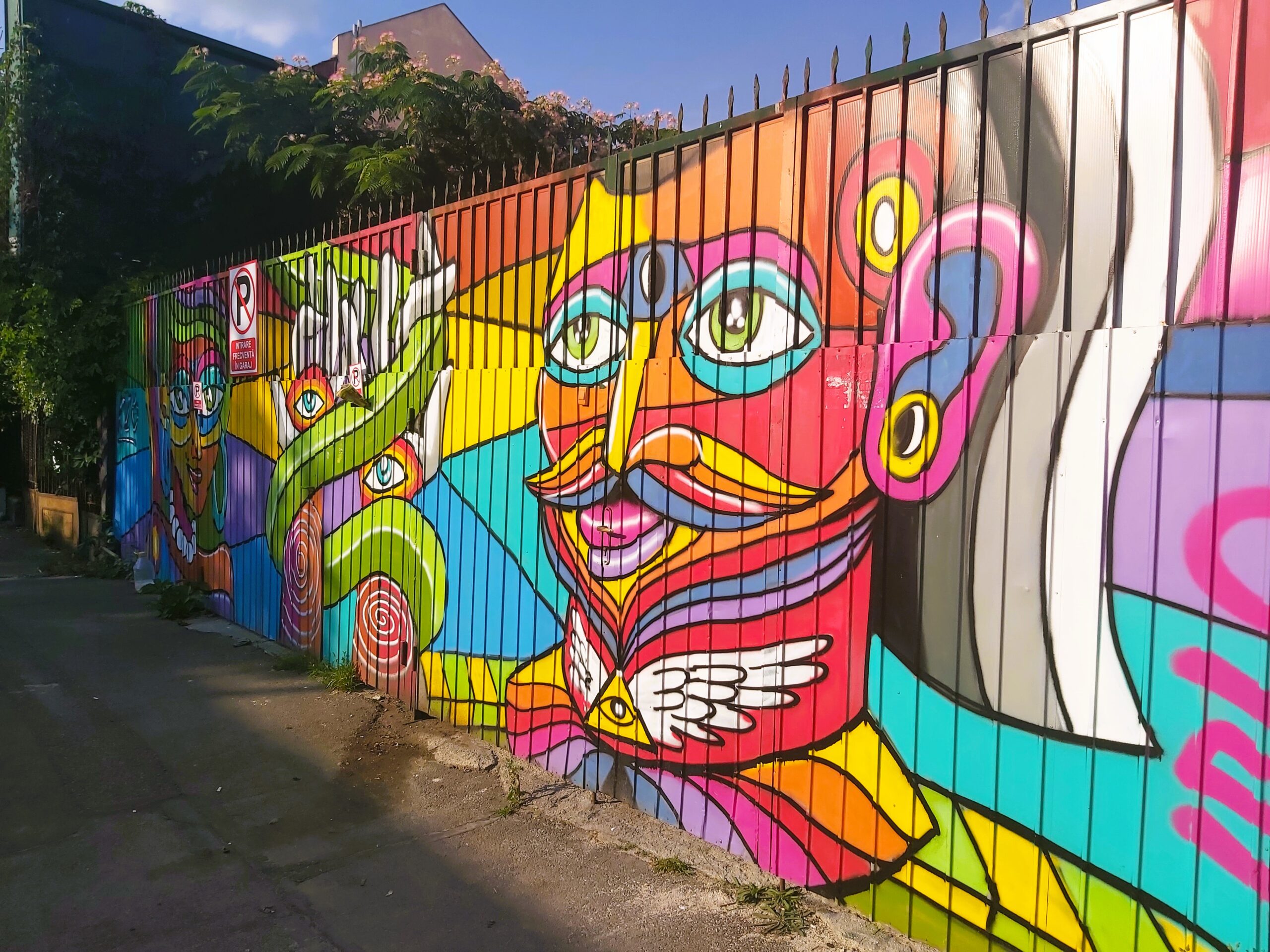 A colourful graffiti picture of a man in București, Romania