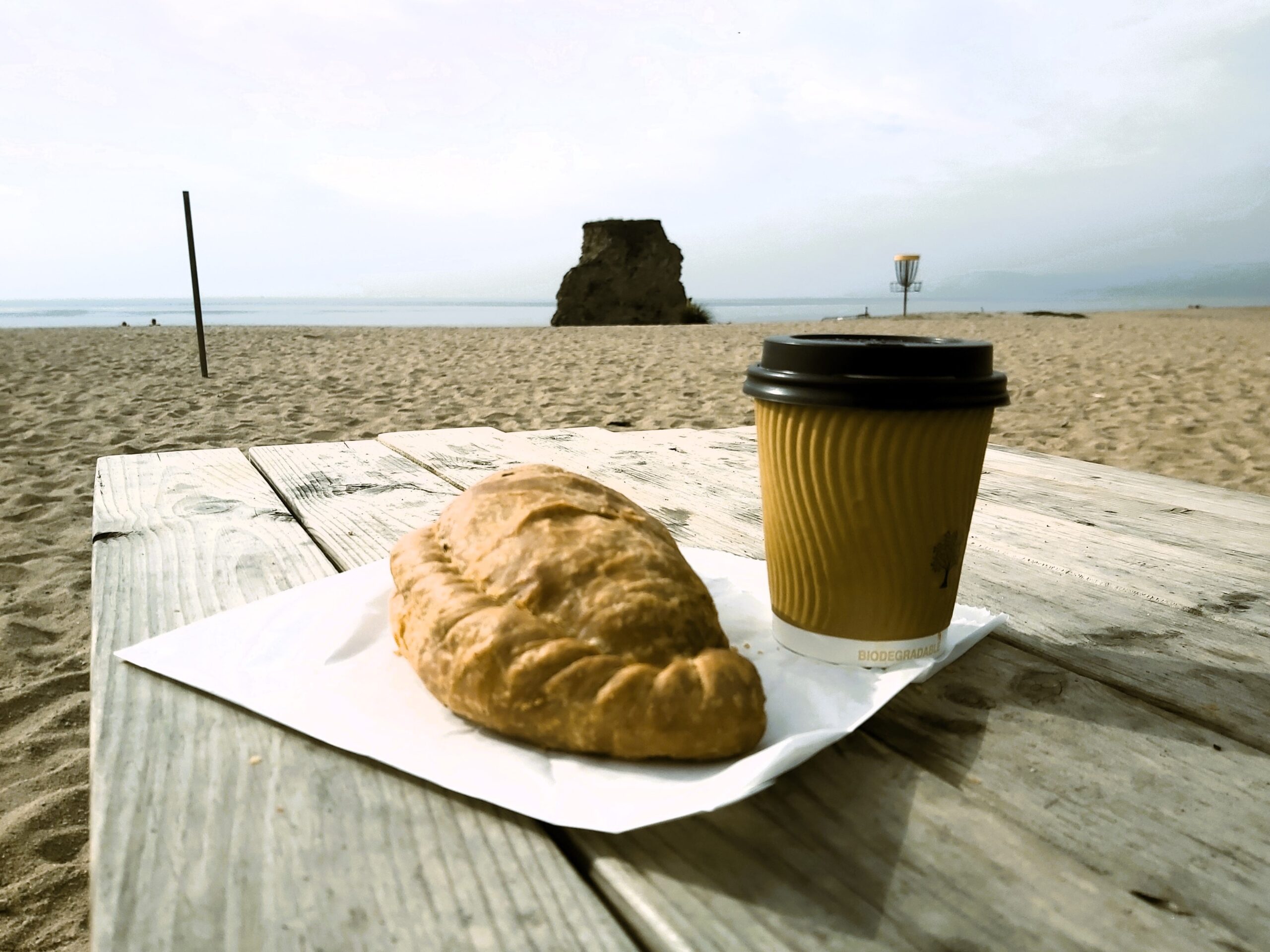 Cornish pasty and coffee at Carlyon bay, Cornwall, England