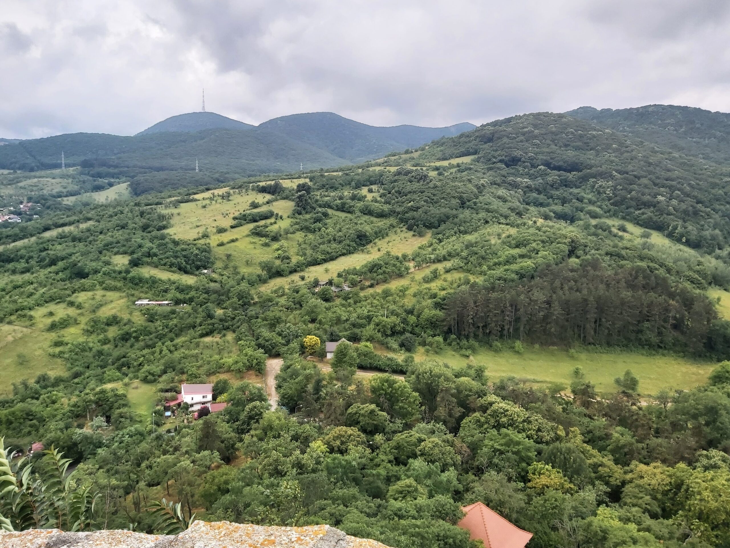 View of lush hillsides from Deva Fortress, Romania