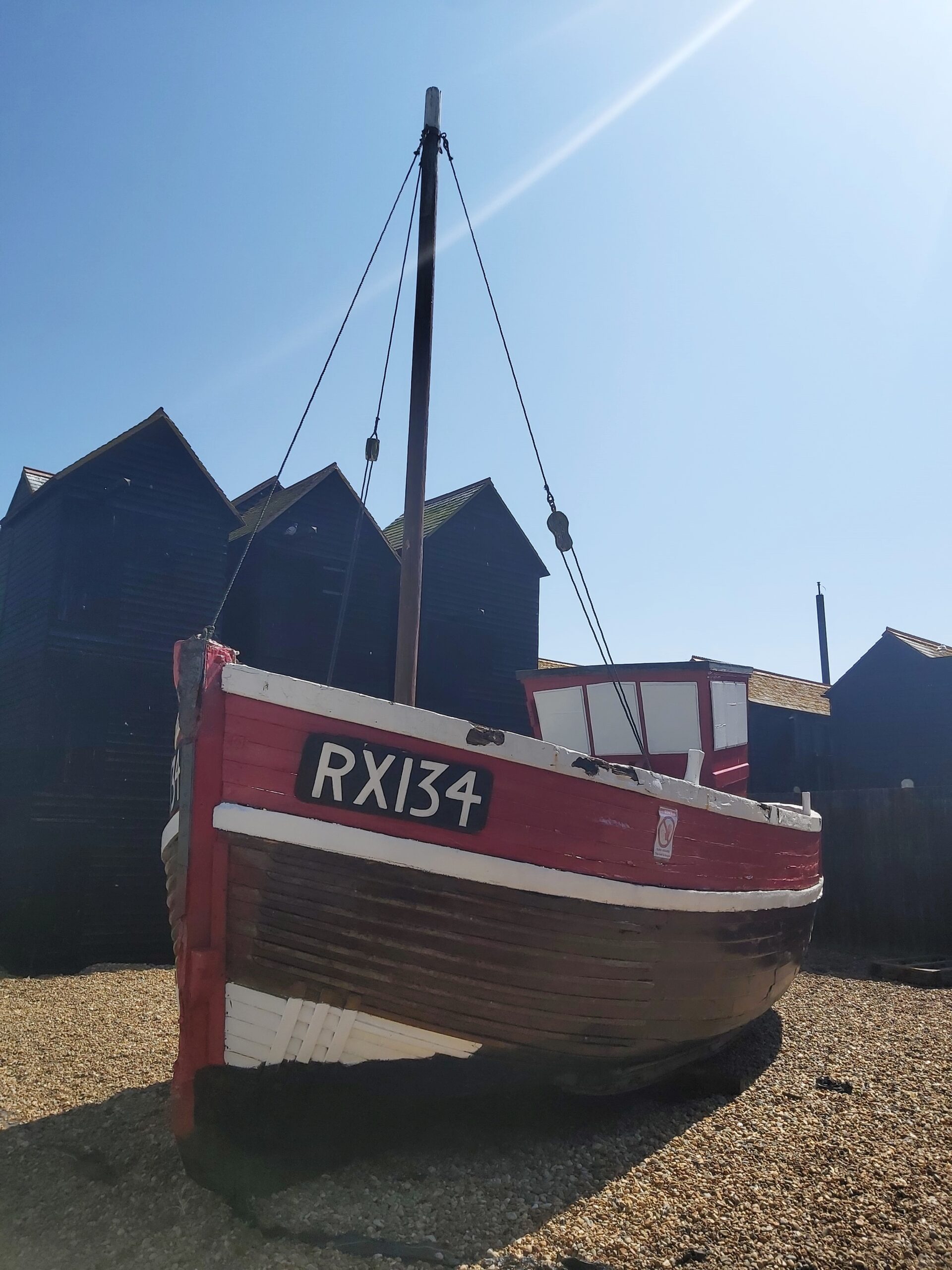 A red and brown boat in Hastings, England
