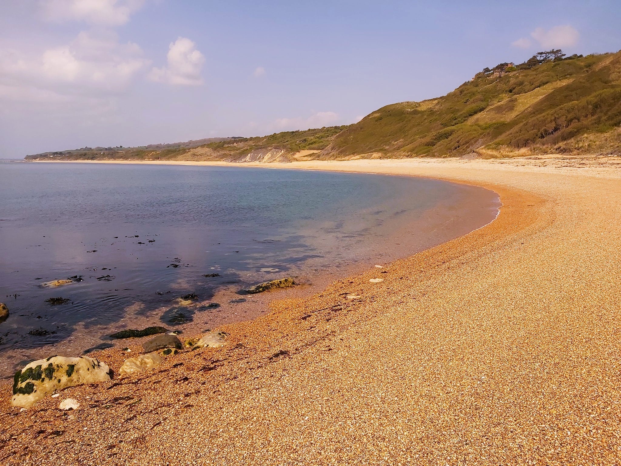Rolling hills and the shingle at Ringstead beach, Dorset, England