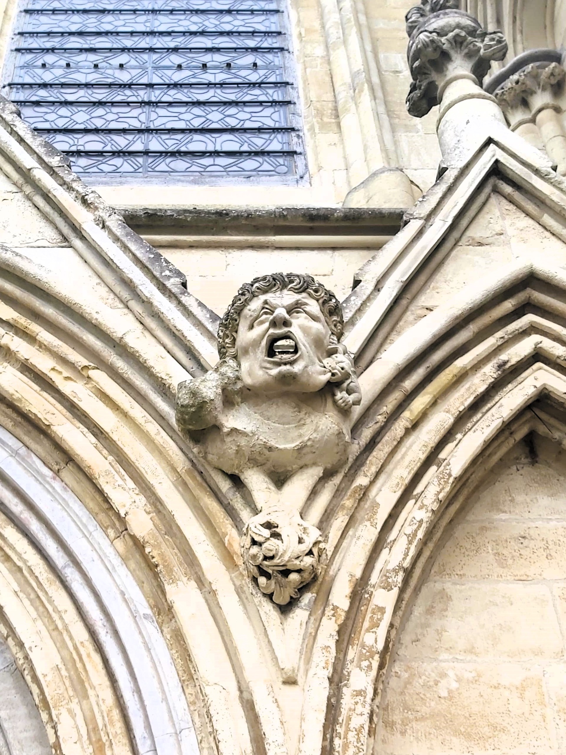 A grotesque on the exterior of Winchester Cathedral, England