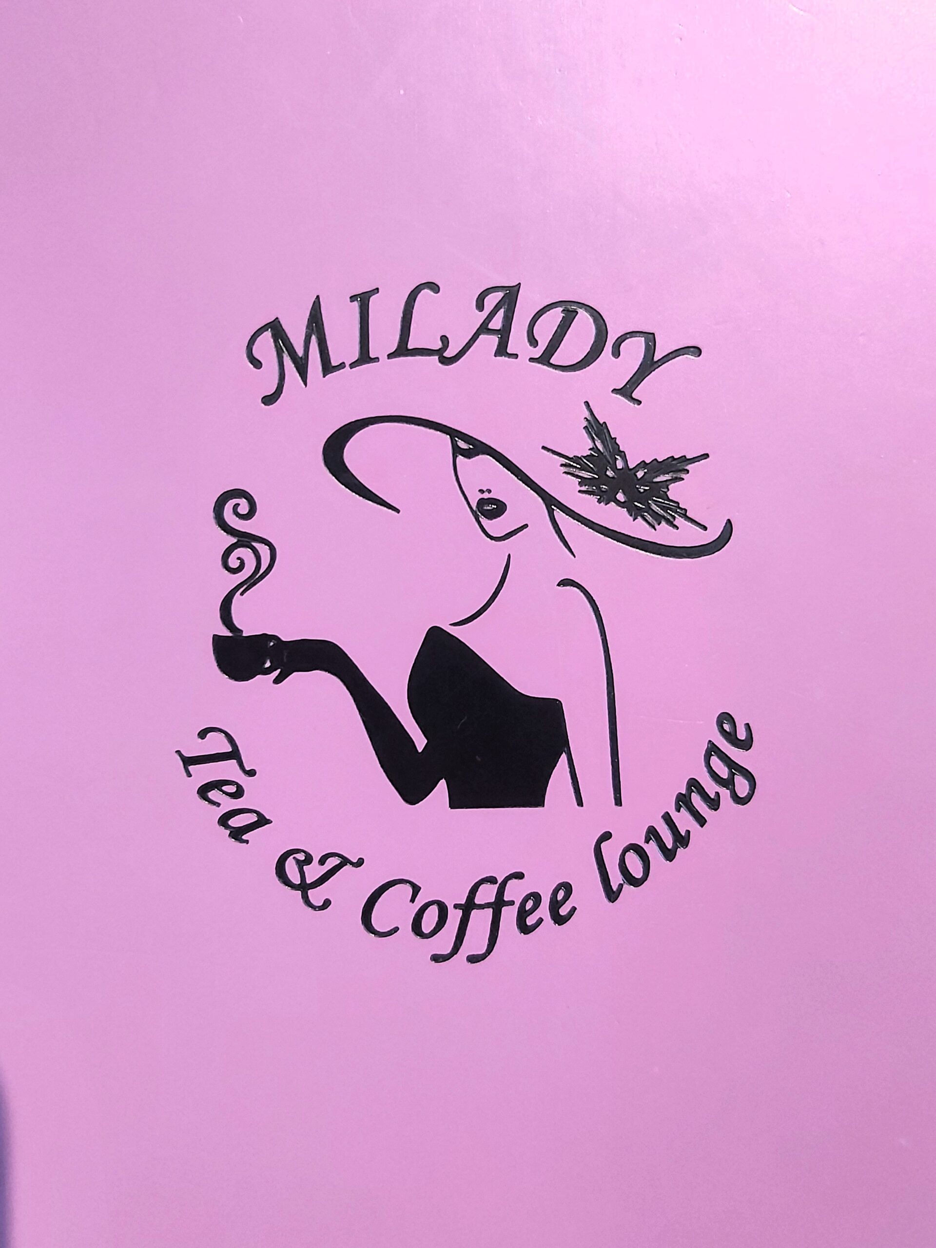 Pink sign at Milady Cafe in Ware, England