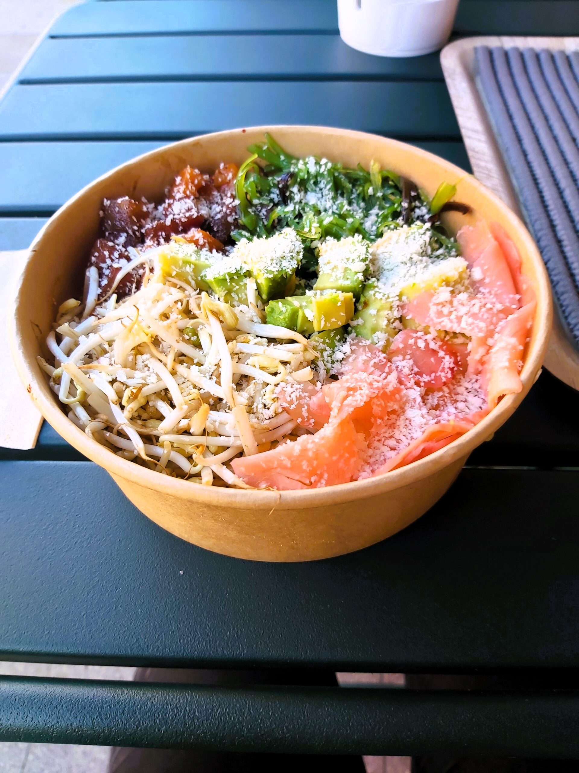 Salmon and ginger salad bowl at Tasty Poke restaurant in Mestre, Italy