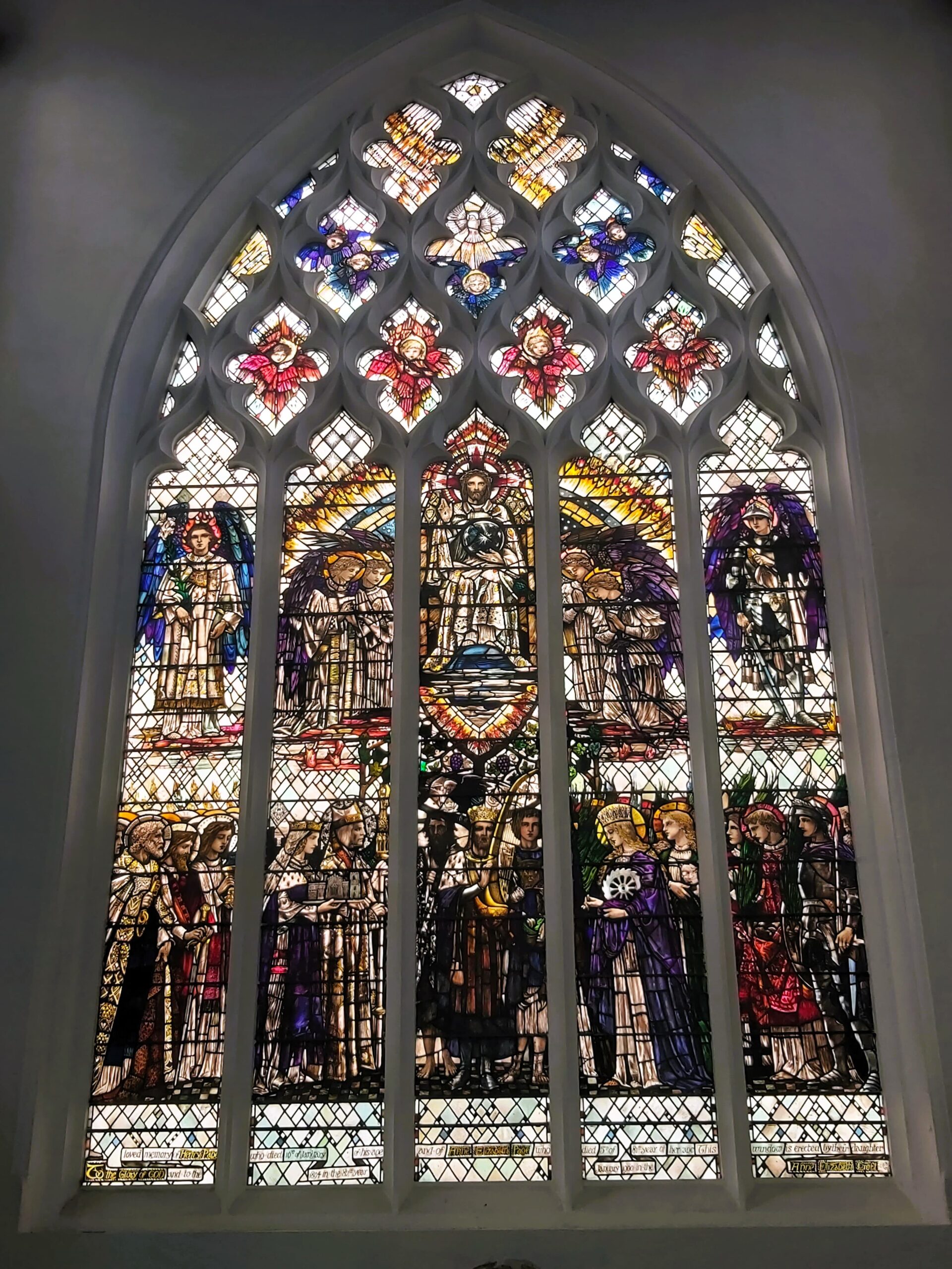 A large stained glass window in St Mary's Church, Ware, England