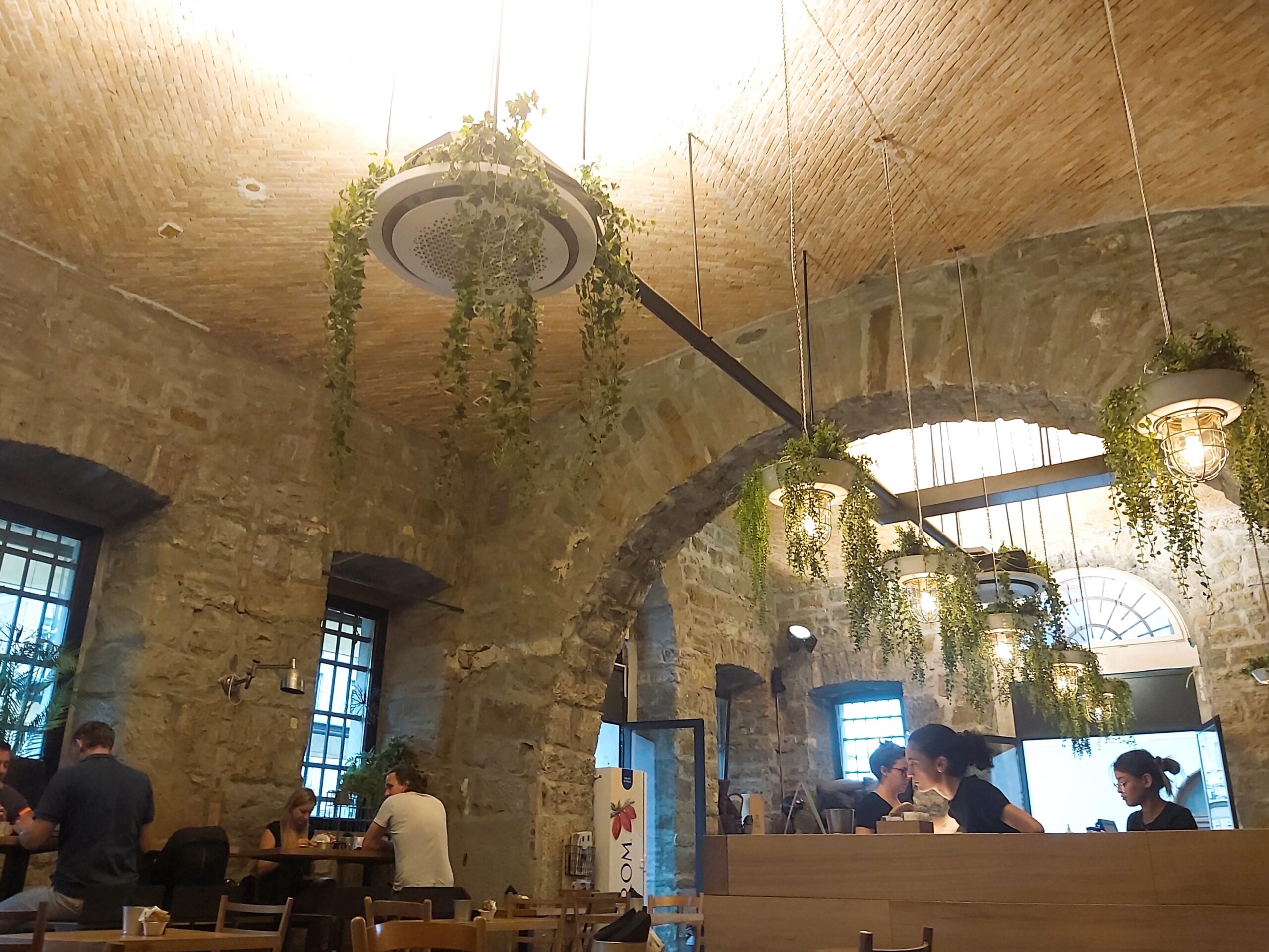 An historic building turned cafe with domed brickwork ceilings, Trieste, Italy