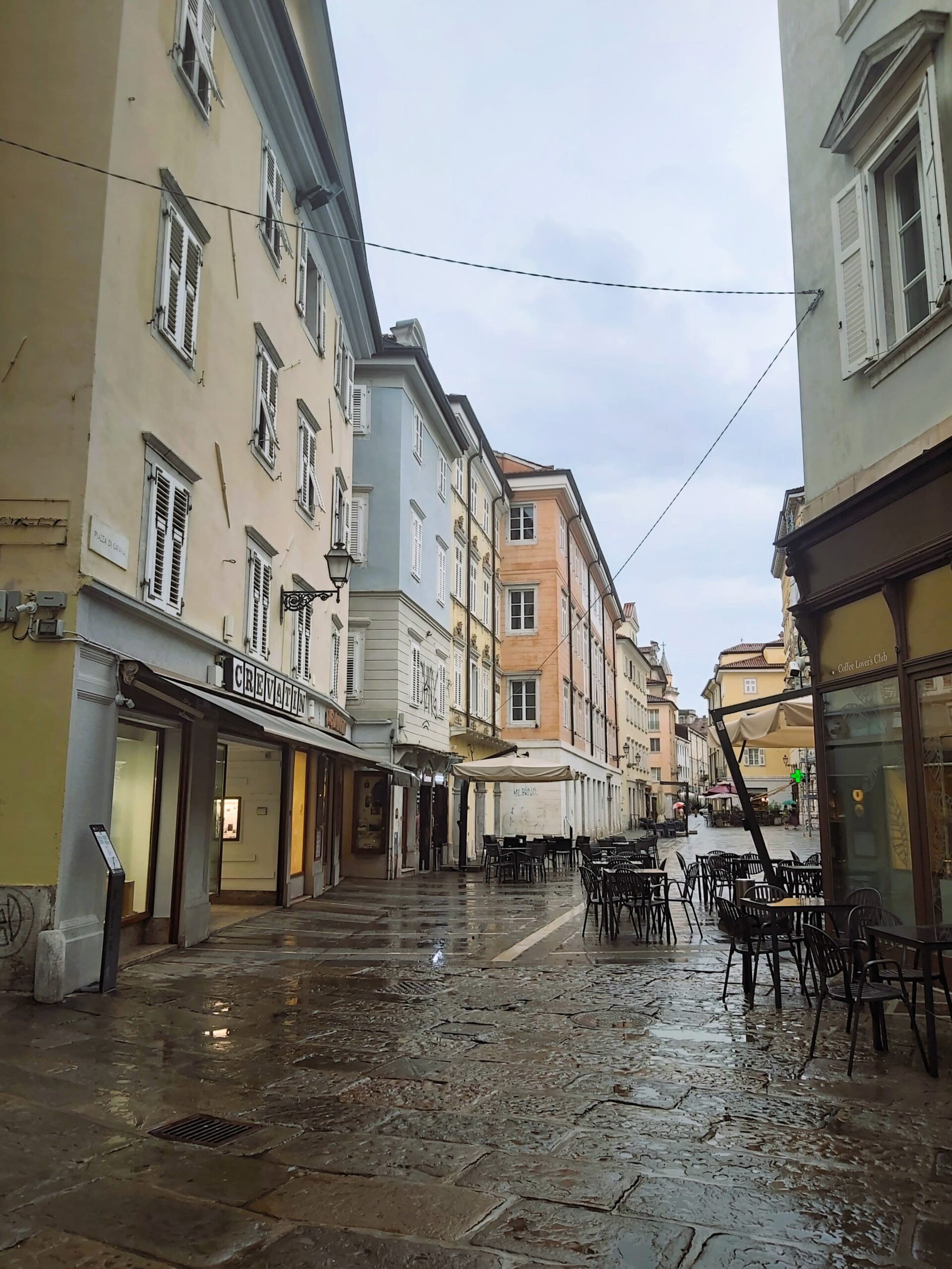 A rain street view, devoid of people, Trieste, Italy