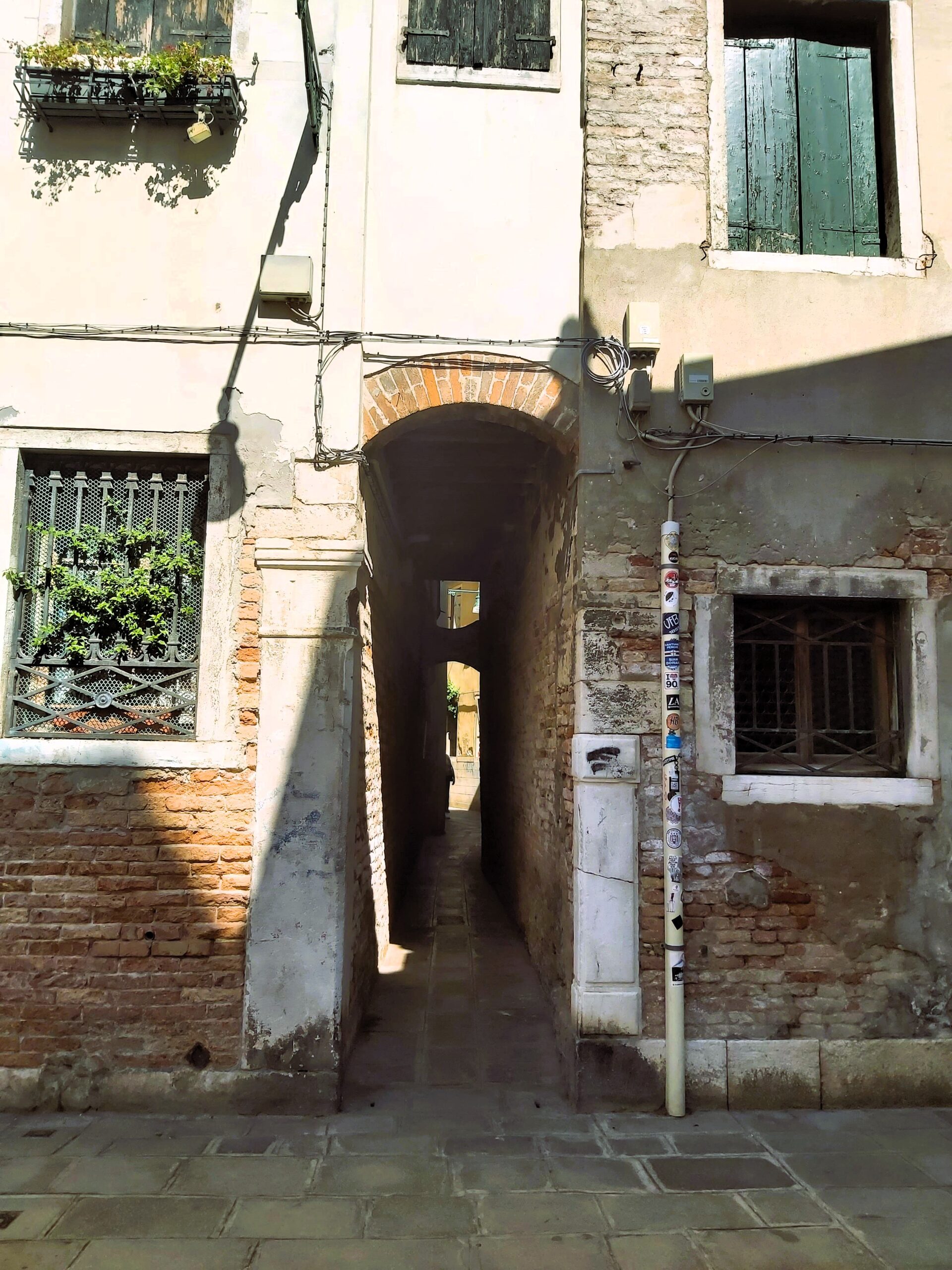 The smallest alleyway in Venice, Italy