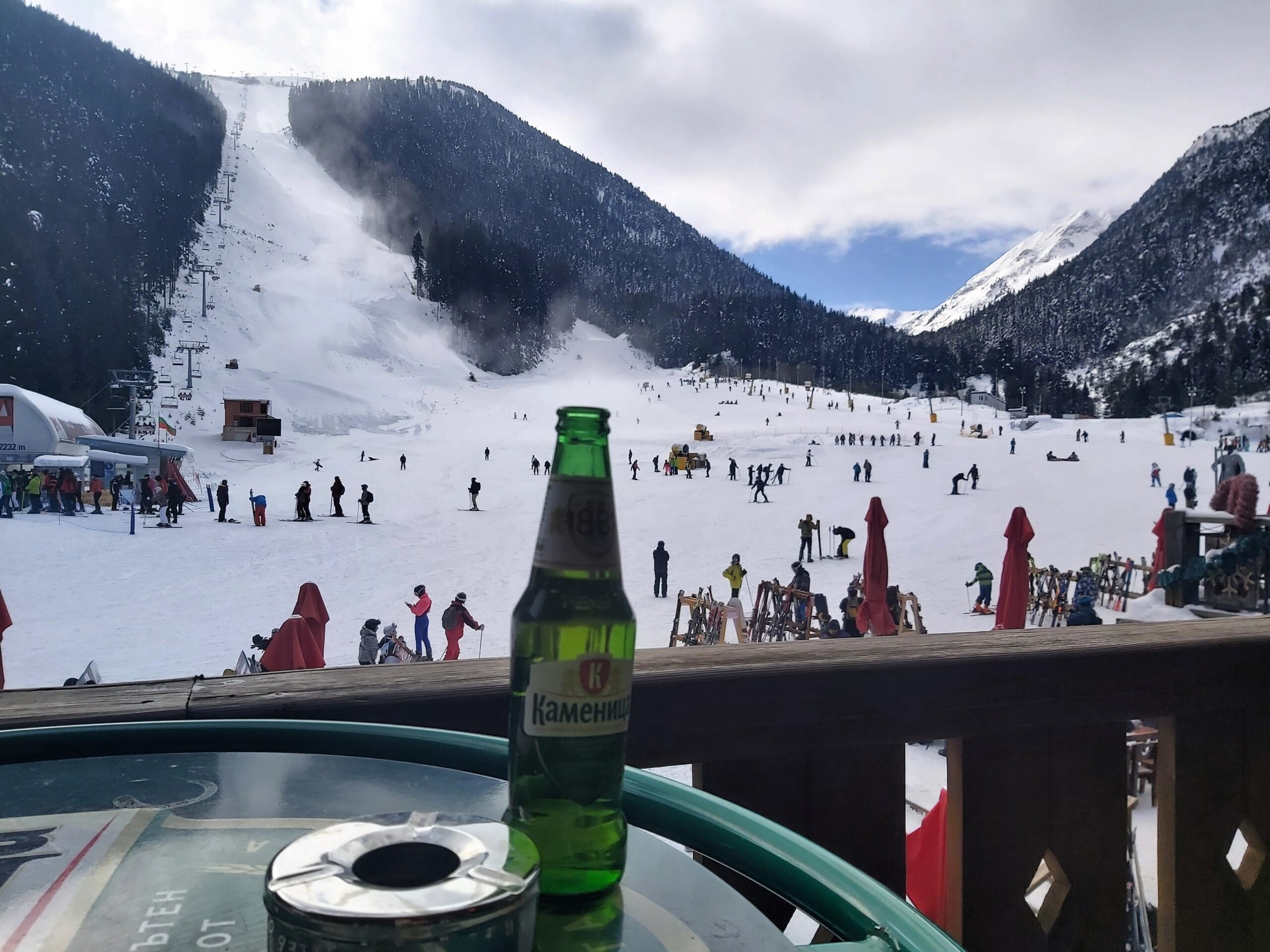 A dull mountain scene with a beer in Bansko, Bulgaria