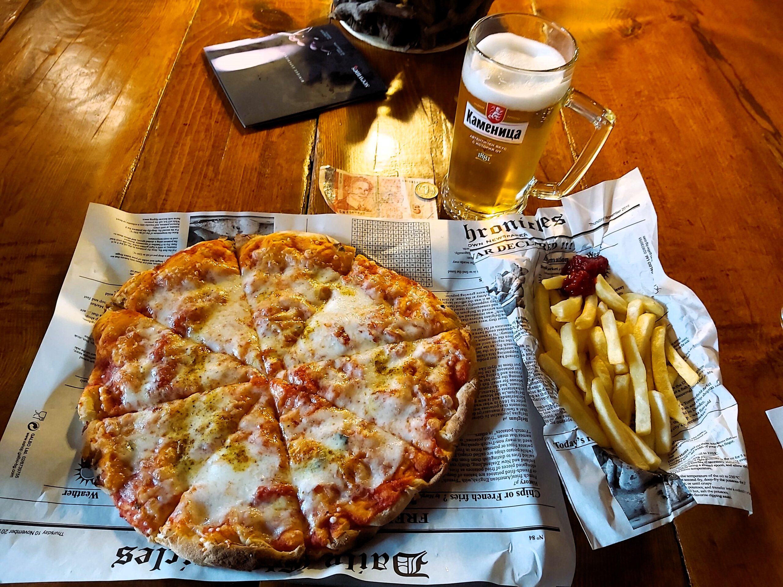 Pizza, beer and chips in Bansko, Bulgaria