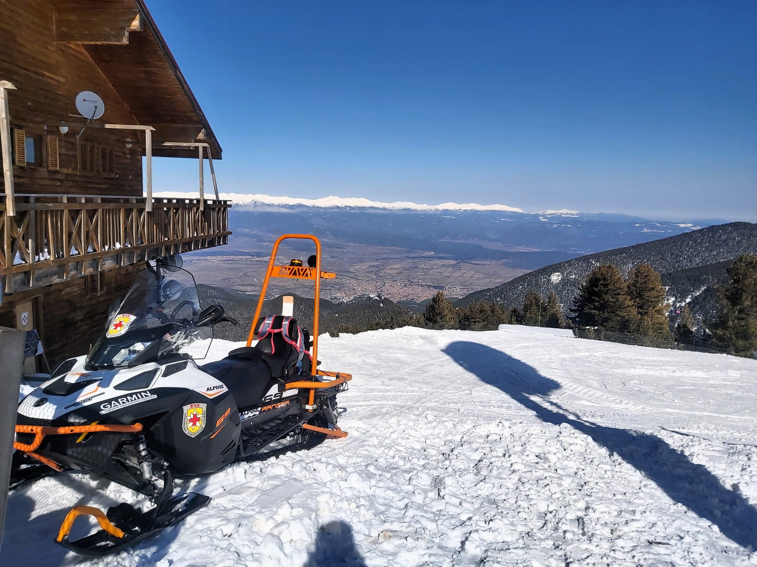 A rescue skiddoo and mountain view in Bansko, Bulgaria